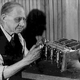 Taylor with a scale model of his engine in 1947 (author unknown)